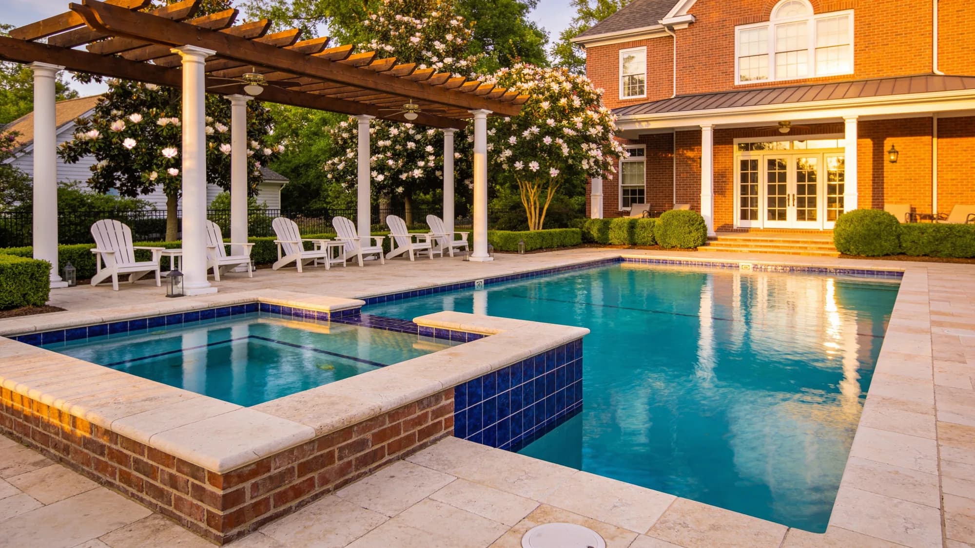 Gunite pool with tiled spa under a pergola